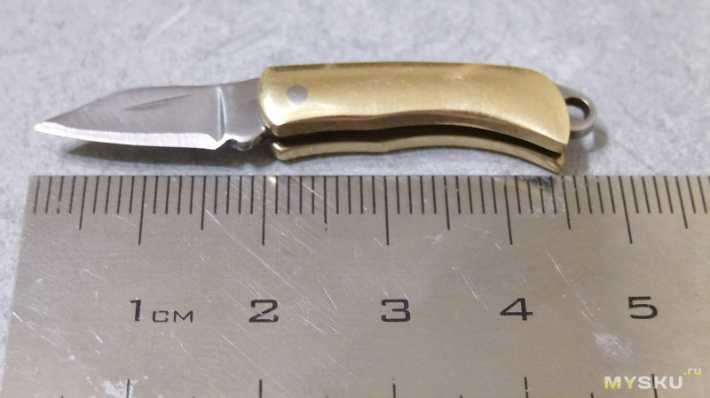 Складной нож с латунной рукоятью