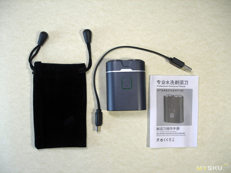 Миниатюрная аккумуляторная электробритва Kemei W301.