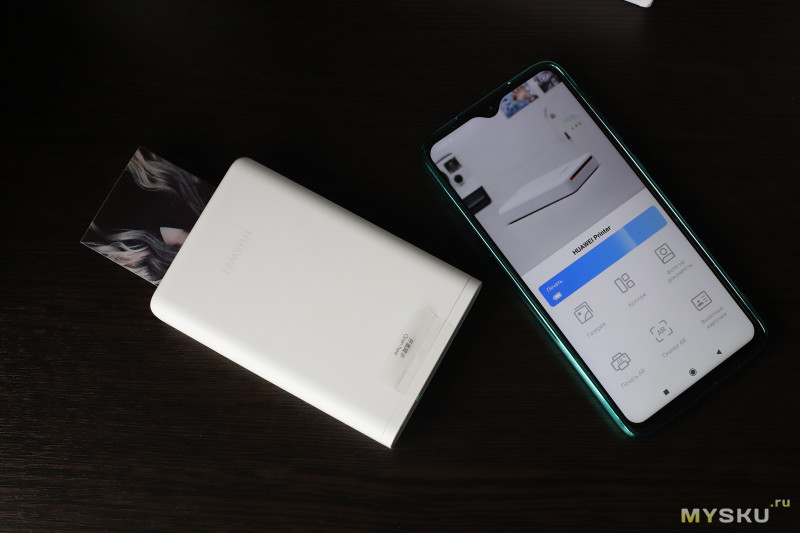 Портативный принтер Huawei для печати фото со смартфона